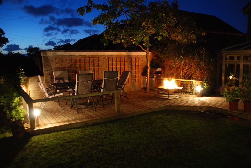 Decking with garden lights and fire pit